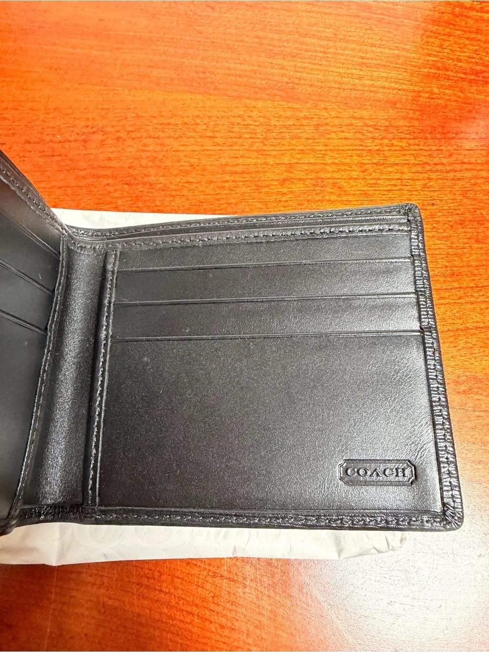 Coach Black Textured Leather Bi-Fold Wallet with Silver Coach Logo